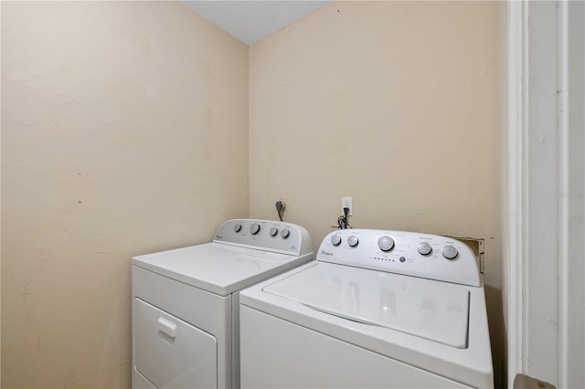 laundry area featuring independent washer and dryer