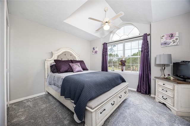 bedroom featuring dark colored carpet, ceiling fan, and lofted ceiling