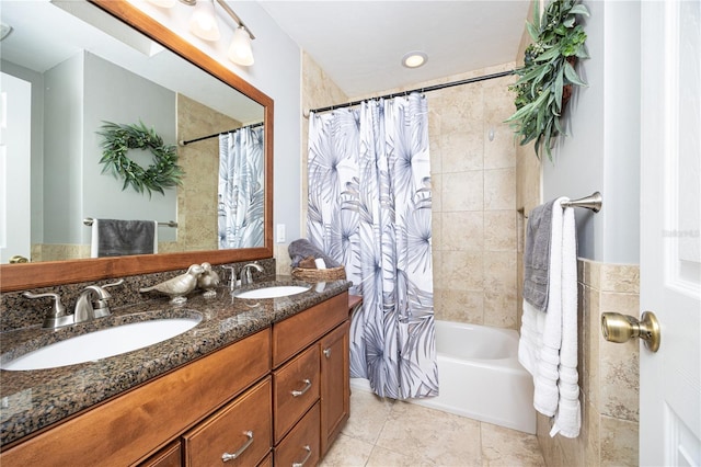 bathroom with tile patterned floors, vanity, and shower / bath combination with curtain