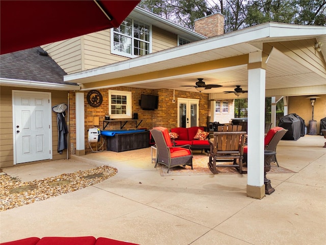 view of patio / terrace with french doors, an outdoor living space, grilling area, and ceiling fan