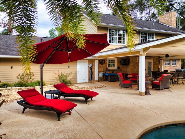 view of patio with an outdoor hangout area and ceiling fan