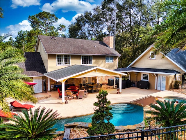 back of house featuring a patio