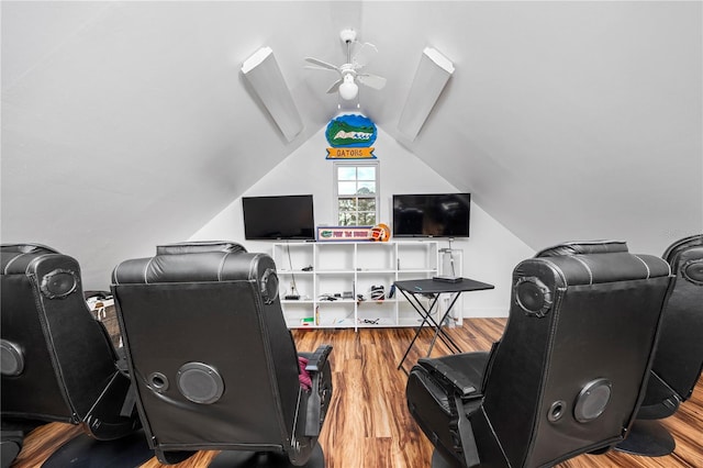 office featuring ceiling fan, wood-type flooring, and vaulted ceiling