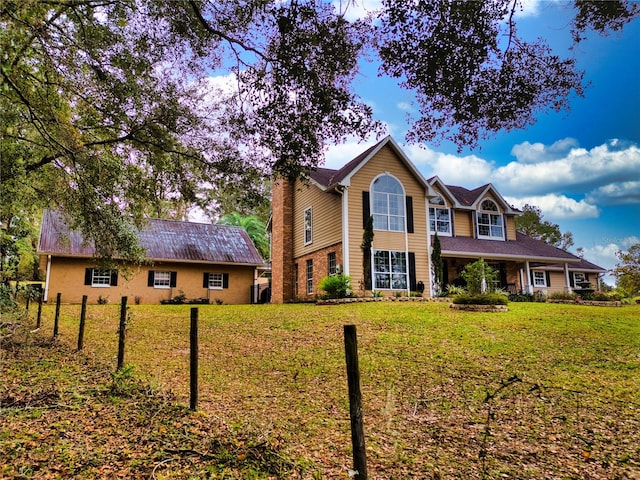 view of front of property with a front yard