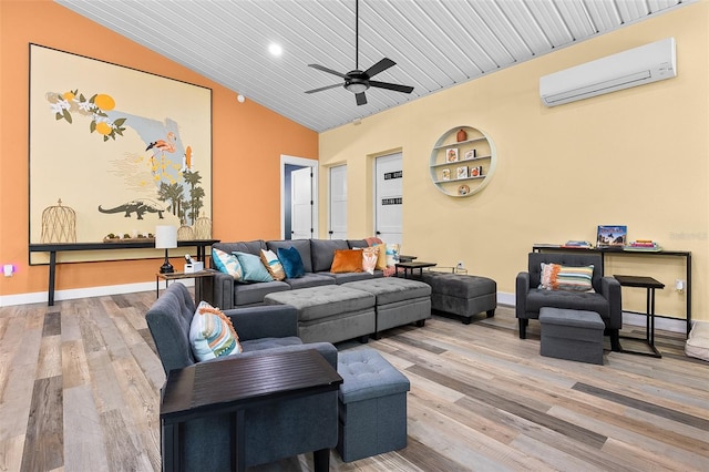 living room with wood ceiling, ceiling fan, wood-type flooring, and a wall mounted air conditioner