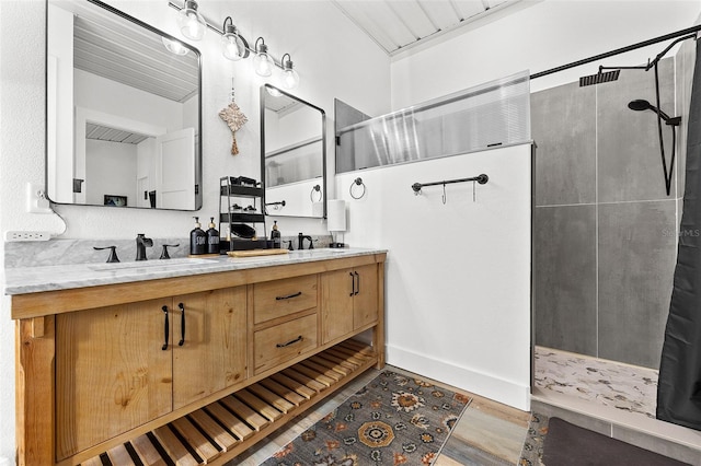 bathroom with vanity, hardwood / wood-style flooring, and curtained shower