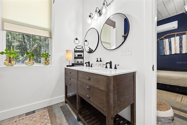 bathroom featuring vanity and wood-type flooring