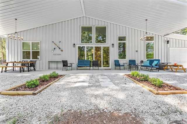 exterior space with an outdoor hangout area and a patio