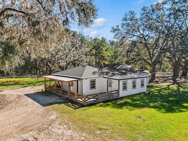 exterior space featuring a front yard