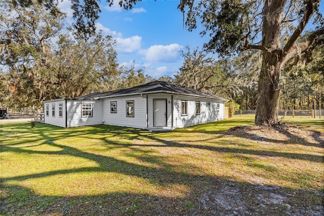 view of front of home with a front lawn