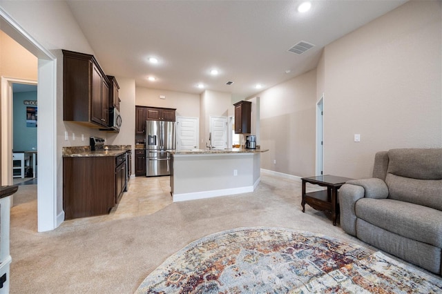 living room with light colored carpet