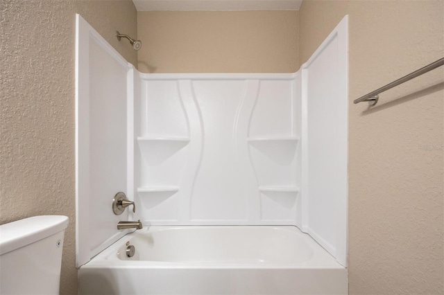 bathroom with  shower combination and toilet