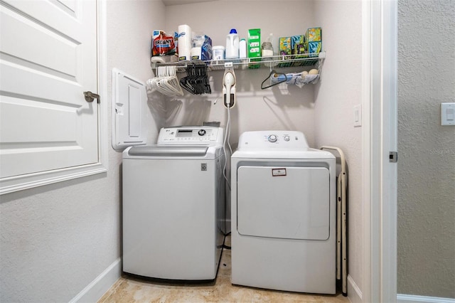 laundry area with separate washer and dryer