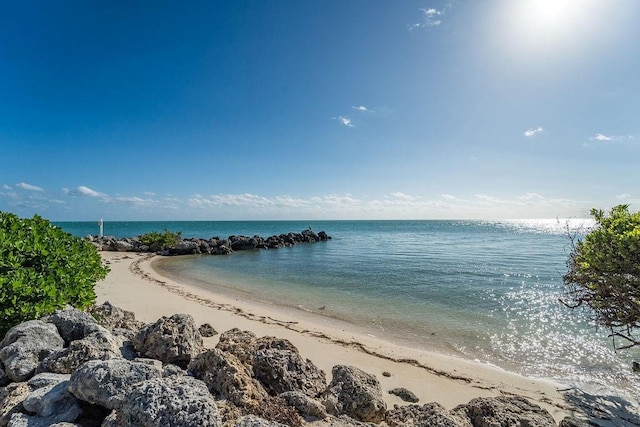 property view of water with a beach view