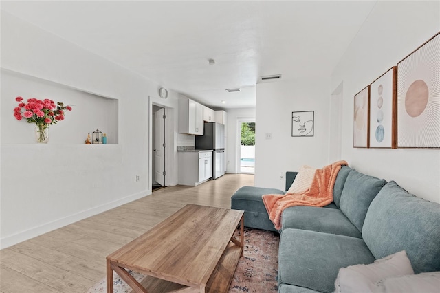 living room featuring light wood-type flooring