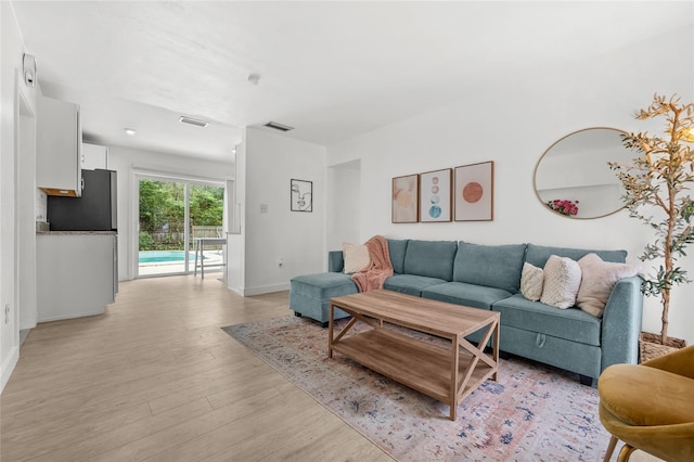 living room with light wood-type flooring