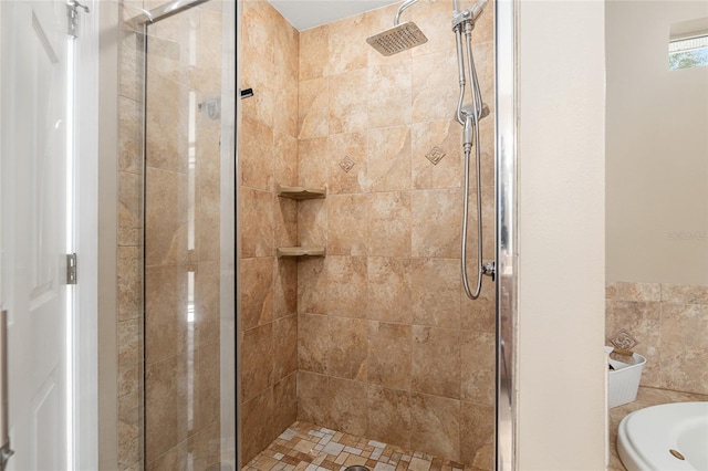 bathroom featuring shower with separate bathtub and tile walls