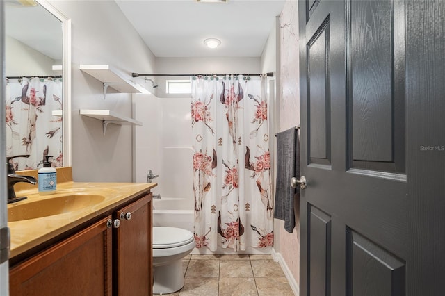 full bathroom with vanity, toilet, tile patterned floors, and shower / bath combo