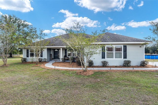 ranch-style home with a front yard