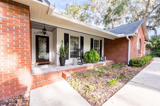 entrance to property with a porch