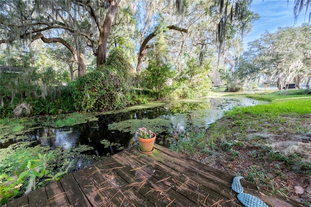 deck featuring a water view