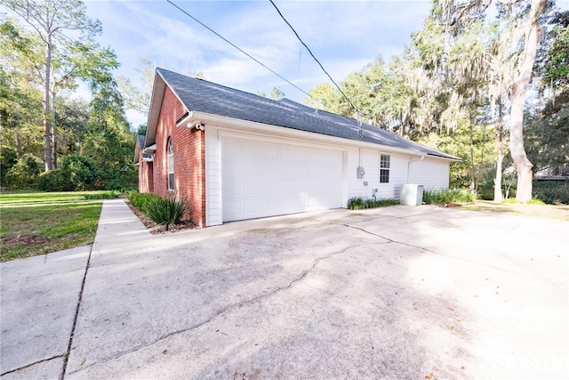 view of home's exterior with a garage