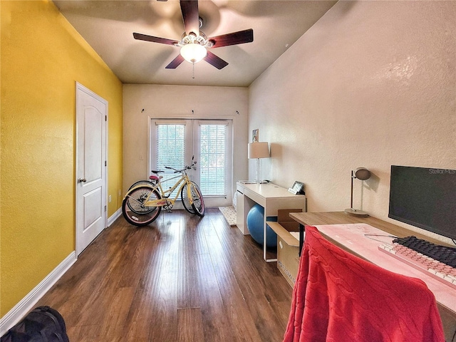 office with ceiling fan, french doors, and dark hardwood / wood-style floors