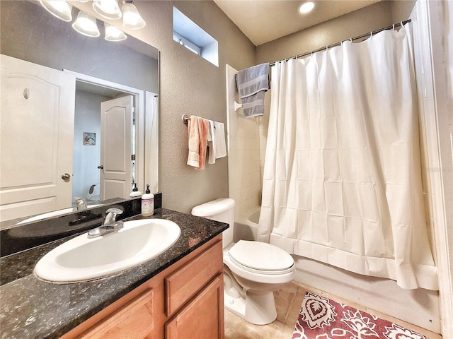 full bathroom featuring tile patterned flooring, vanity, shower / tub combo with curtain, and toilet