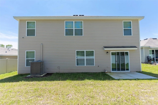 back of property featuring a patio area, a yard, and cooling unit