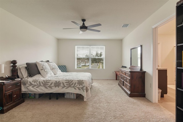 bedroom featuring ceiling fan and light colored carpet