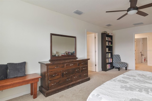 bedroom with light colored carpet and ceiling fan