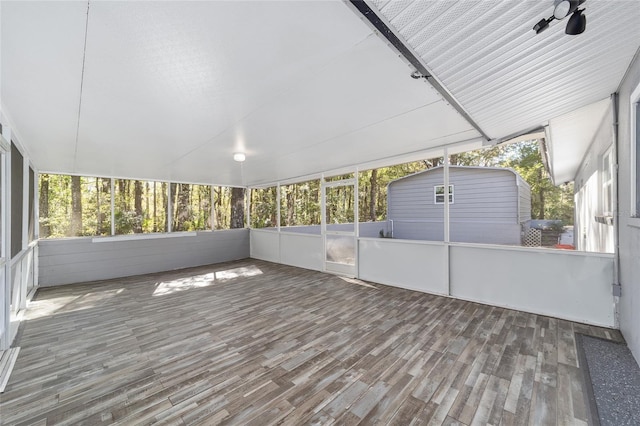 unfurnished sunroom with a healthy amount of sunlight