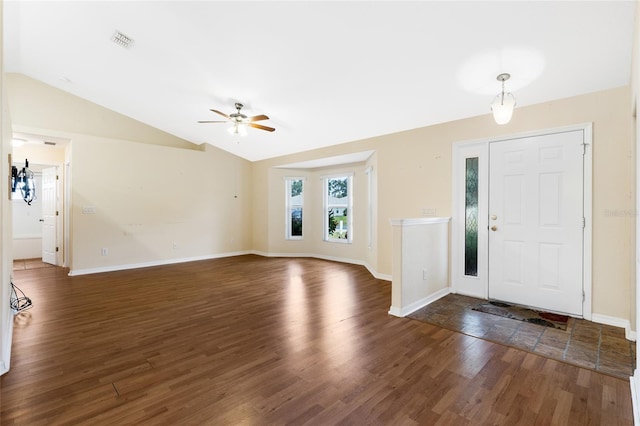 entryway with dark hardwood / wood-style floors, ceiling fan, and lofted ceiling