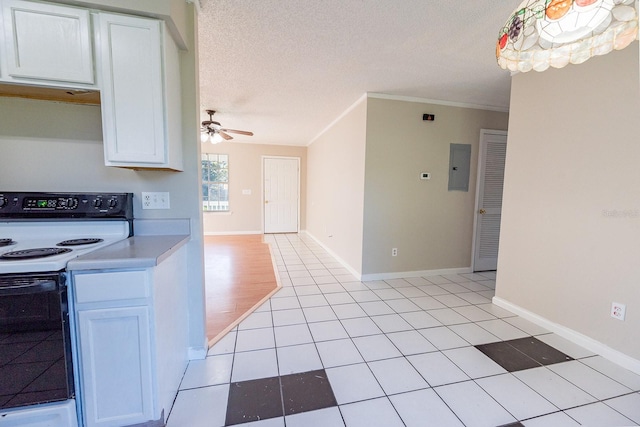 kitchen featuring white electric range oven, a textured ceiling, ceiling fan, light tile patterned floors, and white cabinets