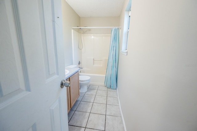 full bathroom featuring tile patterned flooring, shower / bathtub combination with curtain, a textured ceiling, and toilet