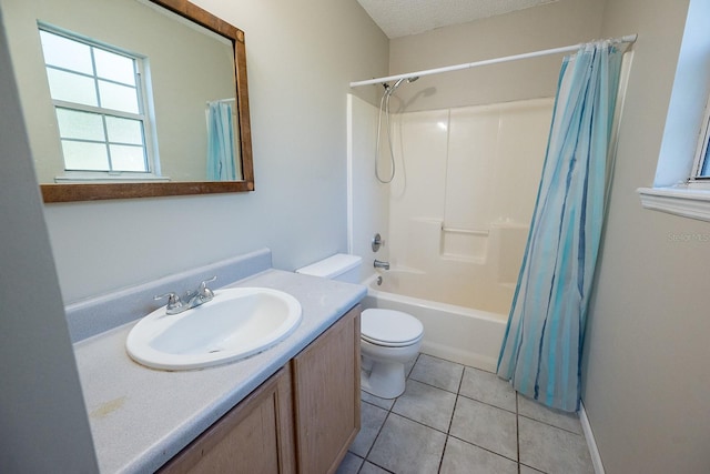 full bathroom with vanity, tile patterned flooring, toilet, shower / bathtub combination with curtain, and a textured ceiling