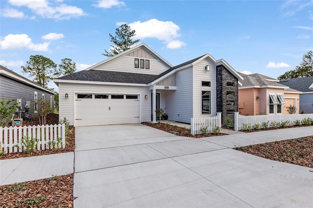 view of front of home with a garage