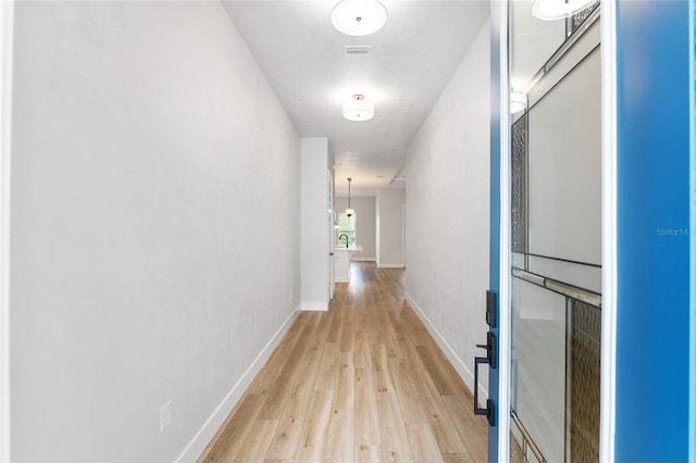 hall featuring light hardwood / wood-style floors