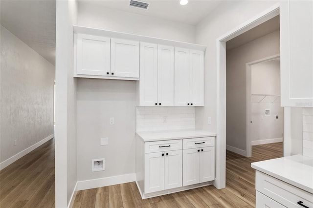 washroom featuring light hardwood / wood-style flooring