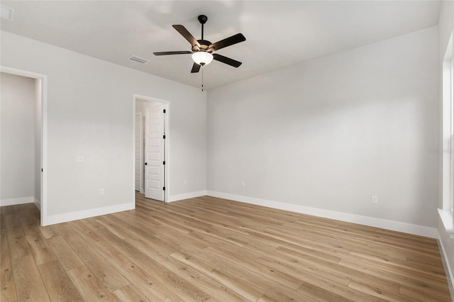 unfurnished room featuring ceiling fan and light wood-type flooring