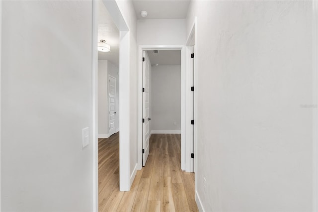 hall featuring light wood-type flooring