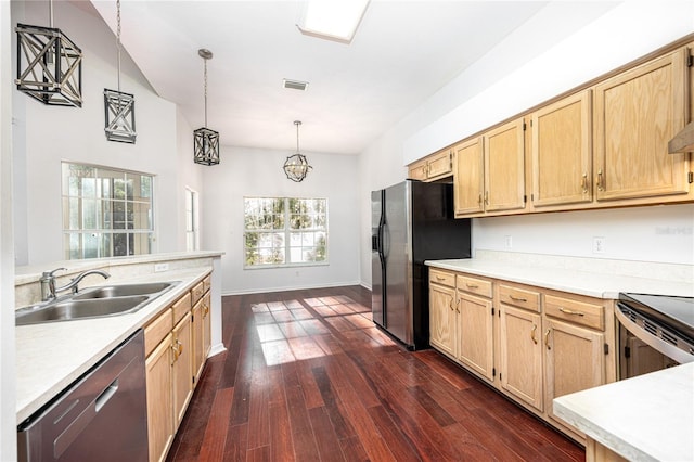 kitchen with sink, stainless steel appliances, hanging light fixtures, dark hardwood / wood-style flooring, and light brown cabinetry