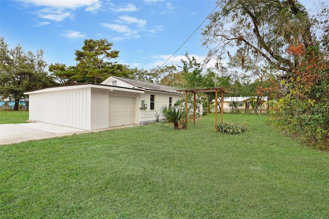 view of yard featuring a garage