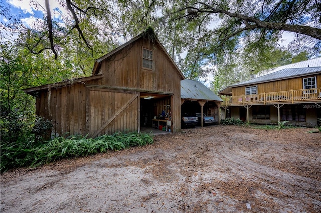 view of outdoor structure with a carport