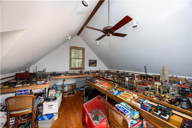 playroom featuring hardwood / wood-style flooring, ceiling fan, and lofted ceiling