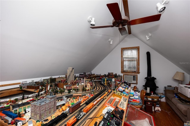 interior space featuring hardwood / wood-style floors, ceiling fan, and lofted ceiling