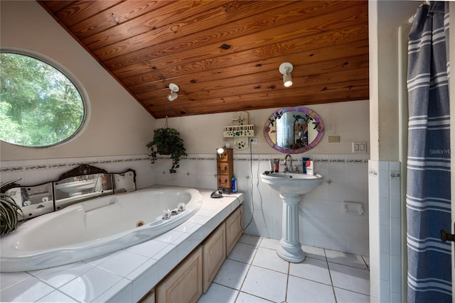 bathroom with lofted ceiling, a bath, wooden ceiling, tile patterned floors, and tile walls