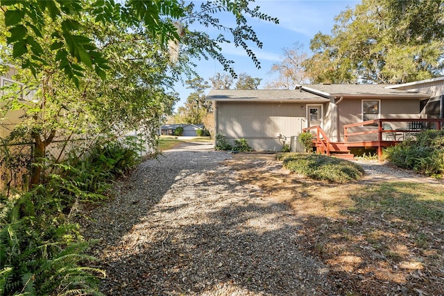 exterior space with a wooden deck