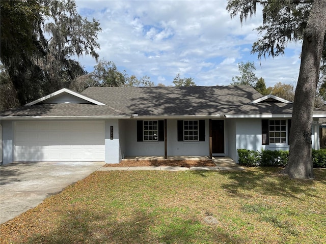 ranch-style house with stucco siding, a shingled roof, concrete driveway, a garage, and a front lawn