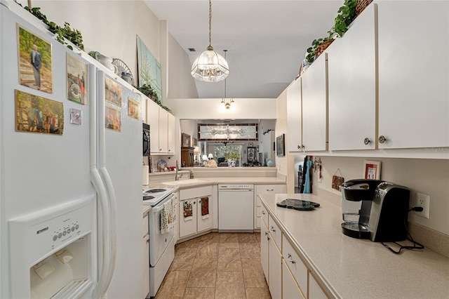 kitchen with white appliances, an inviting chandelier, white cabinets, sink, and decorative light fixtures